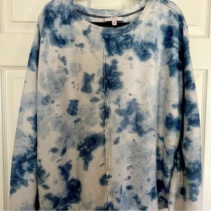 Pullover, looped terry sweatshirt in tye-dye blues. Over-sized, long-sleeved.
